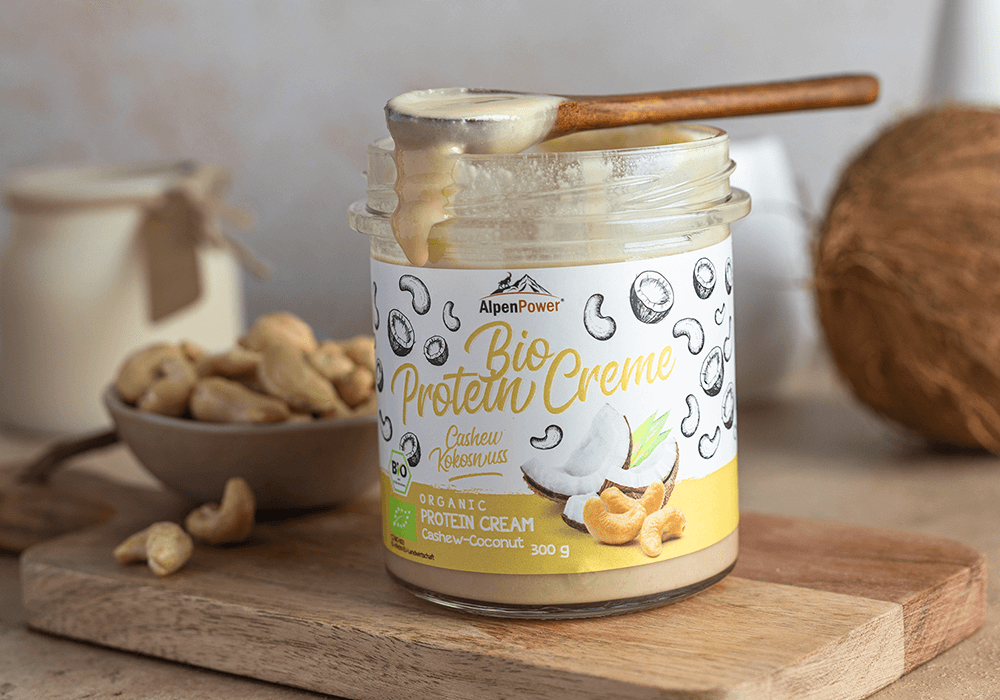 Crema proteica ecológica de anacardos y coco - tropical, cremosa, rica en proteínas